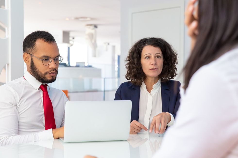 Employer lays off an employee during a meeting