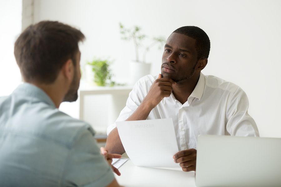 Employer watching for red flags in potential employee during a job interview