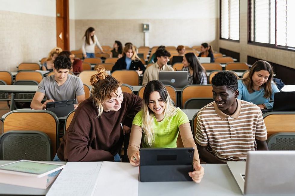 Engaged students work on an assignment