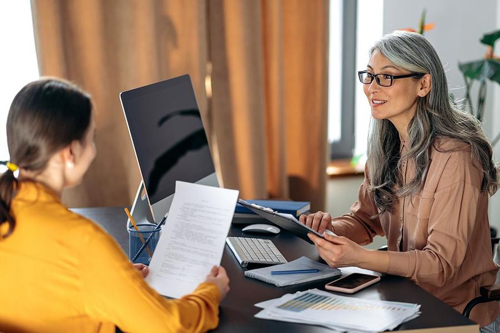 Executive interviews a job candidate for an open position