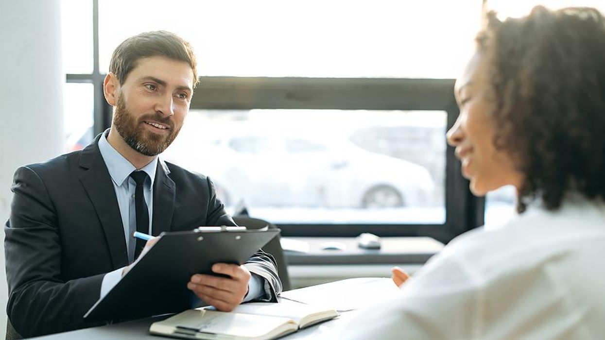 Executive interviews a job candidate