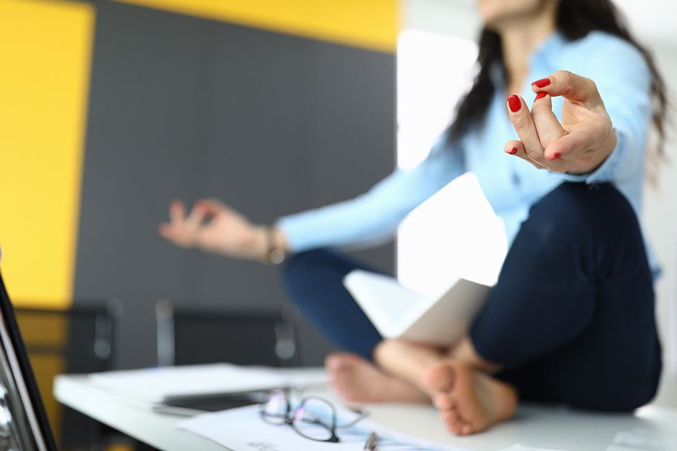 Executive meditates to prevent burnout at work