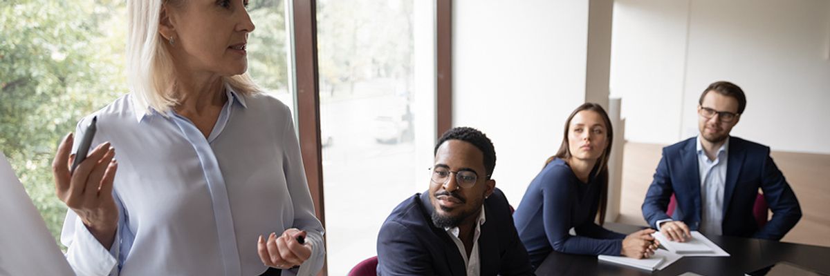 Executive mentoring her colleagues