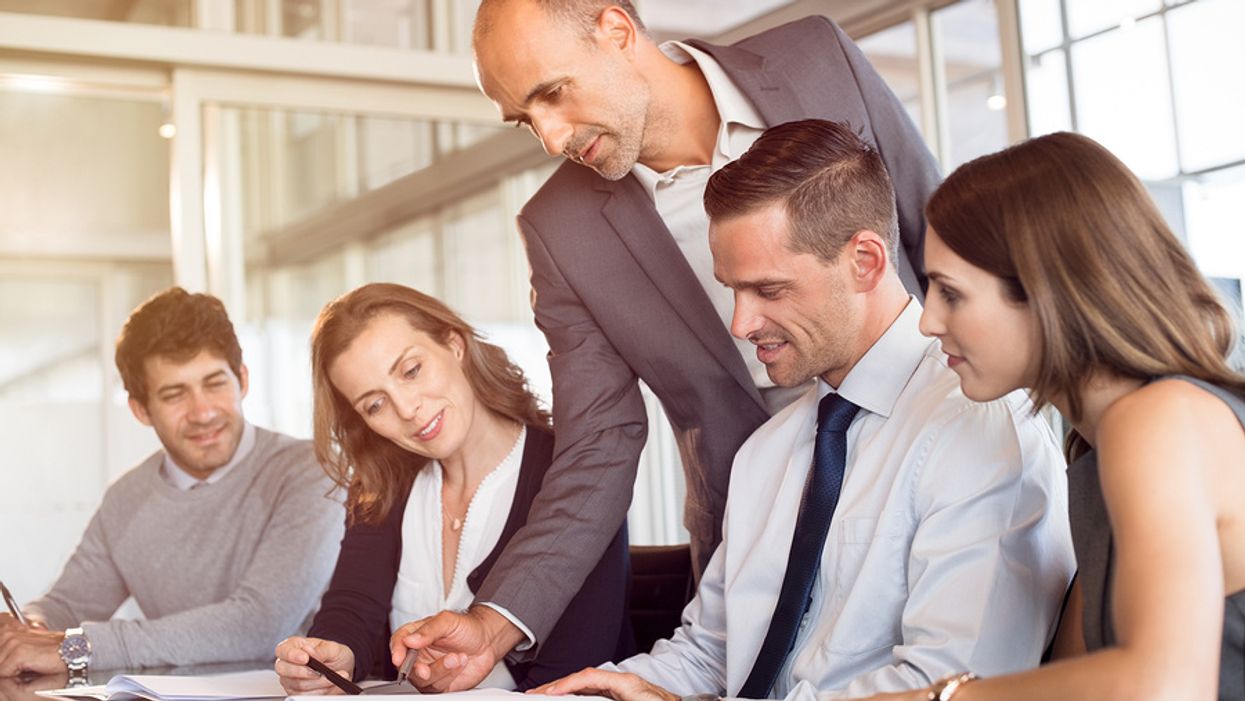 Executives gather together in a meeting to make important decisions