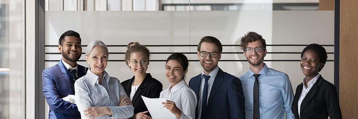 Executives smiles during a work meeting