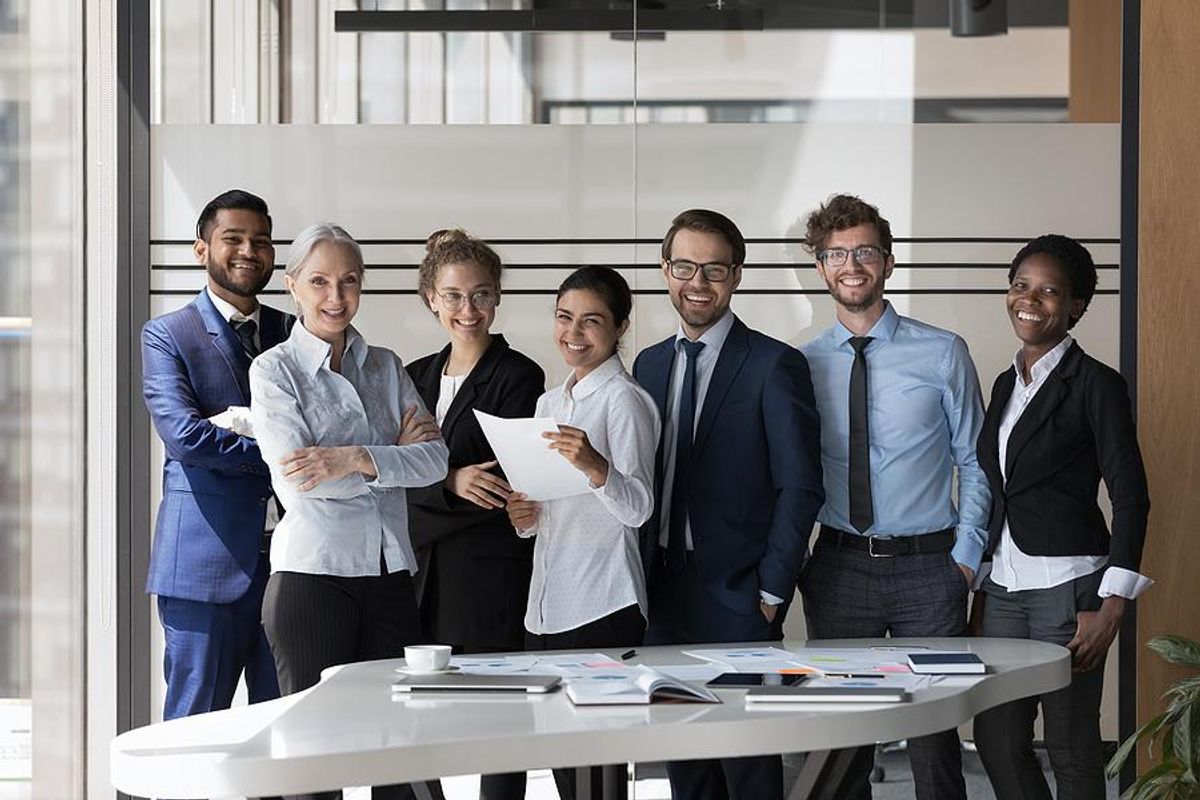 Executives smiles during a work meeting