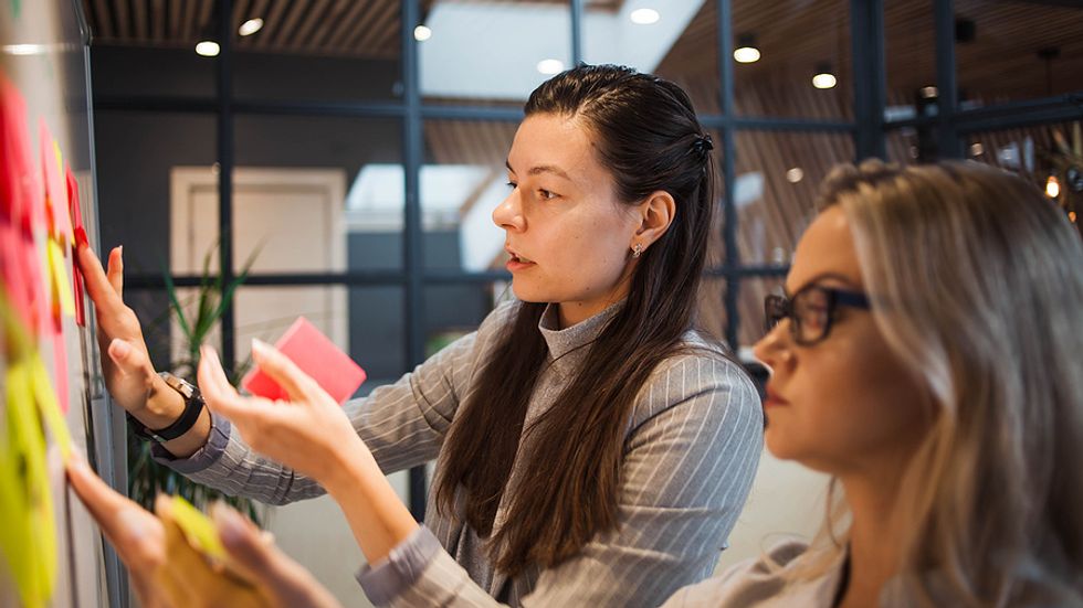 Executives work on a strategy during a crisis