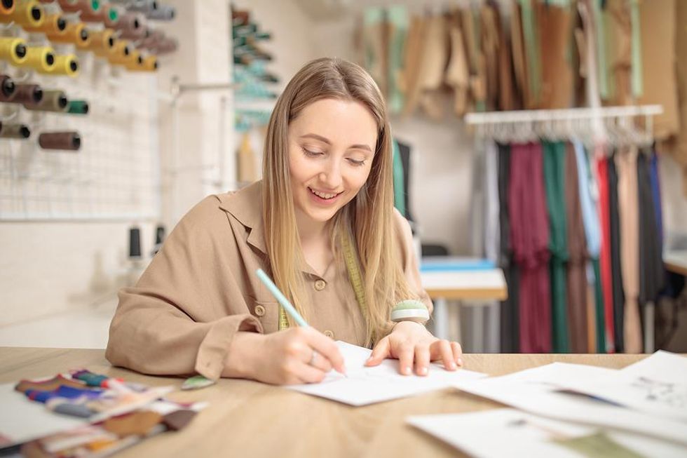 Fashion designer works on a new clothing design