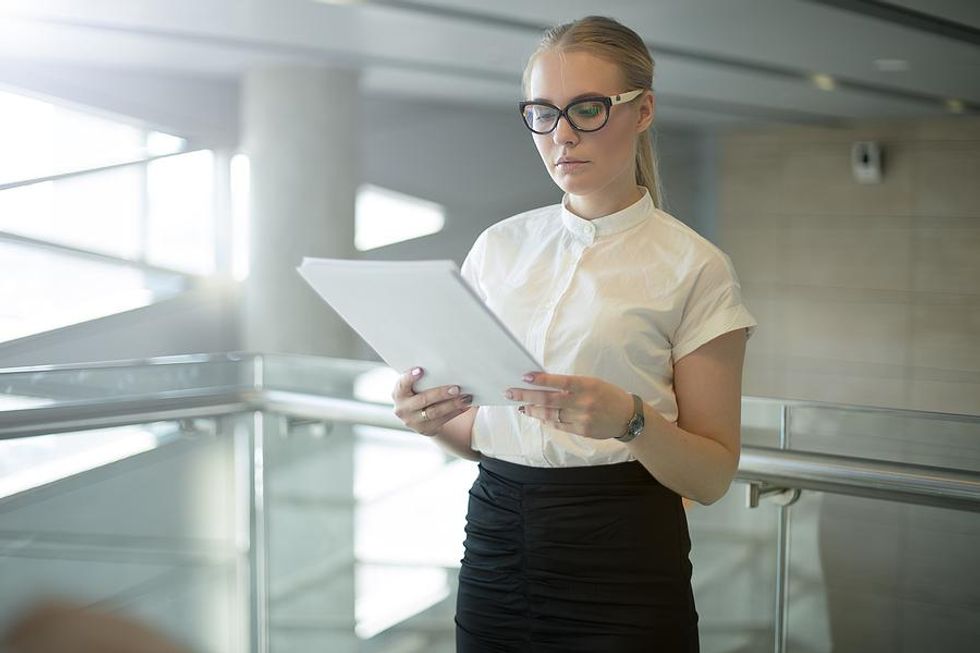 Federal worker reads documents