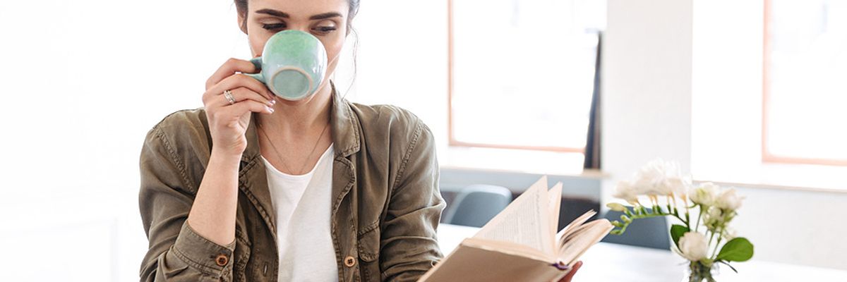 Female executive reads a book