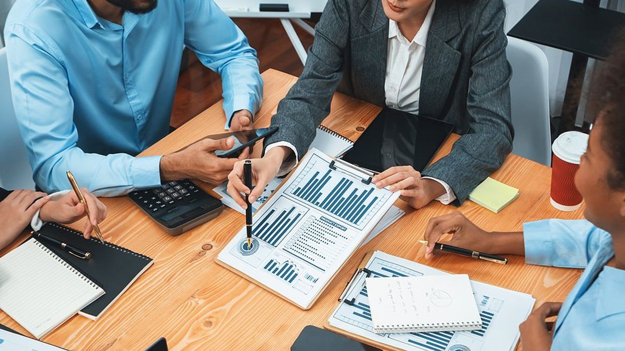 Financial team has a meeting about driving revenue and optimizing profitability