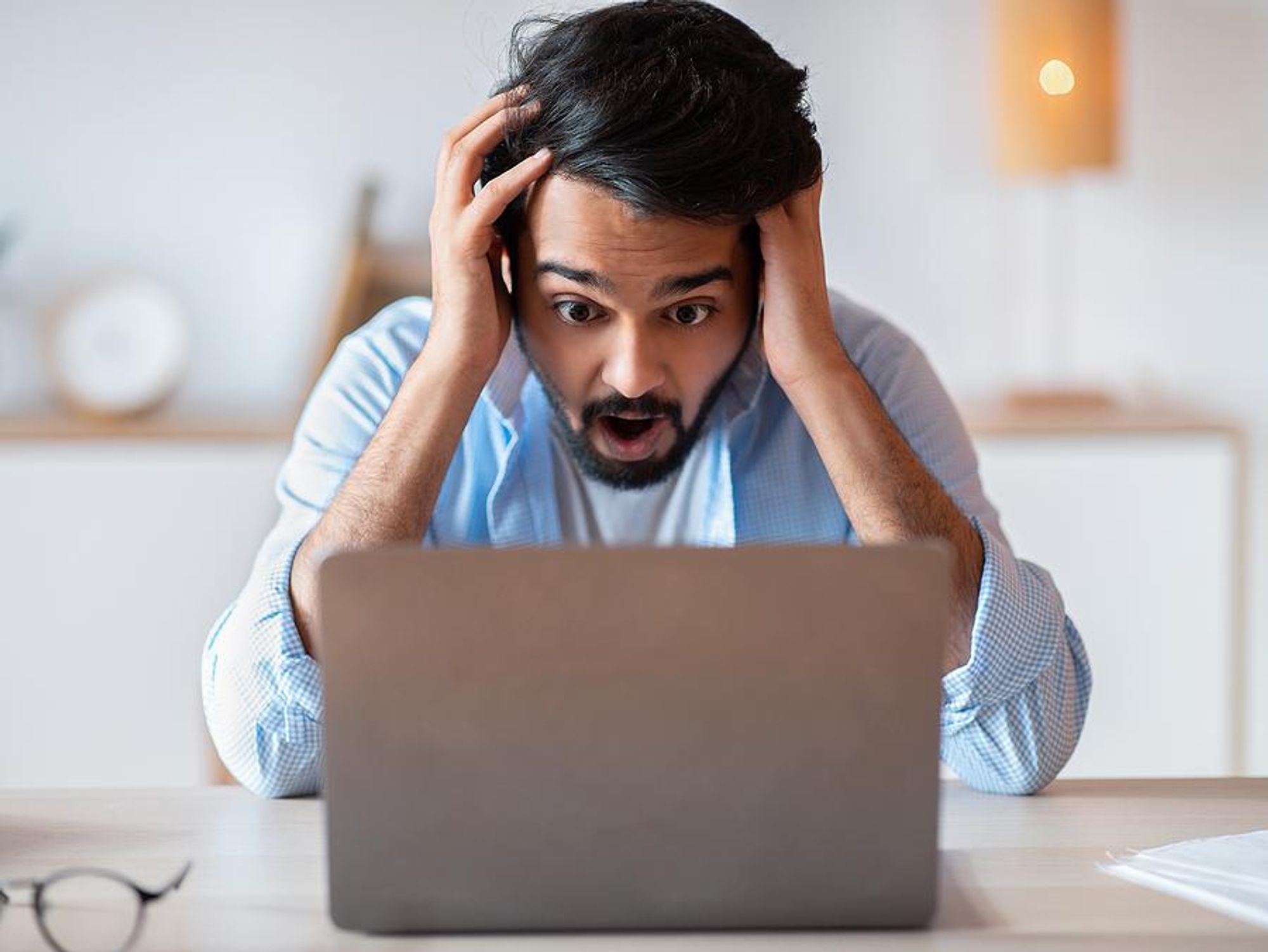 Frustrated man is miserable at work