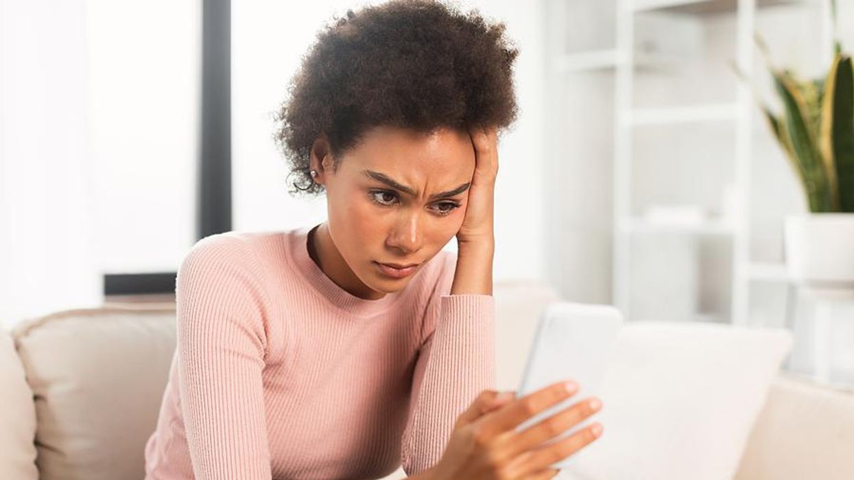 Frustrated woman looking for a job while unemployed
