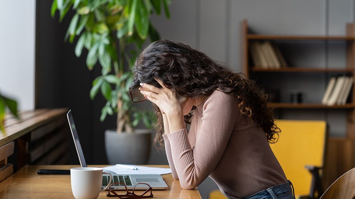 Frustrated woman on laptop tries to figure our why her job search is lasting over 6 months