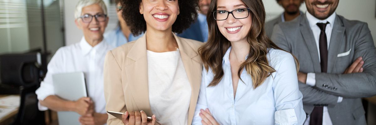 Group of employees happy with their company's workplace culture