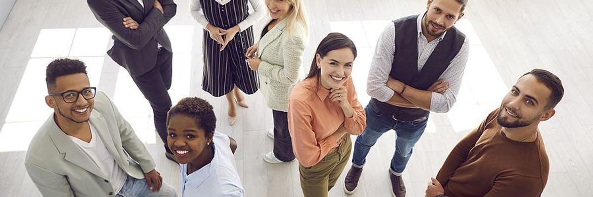 Group of happy employees at work