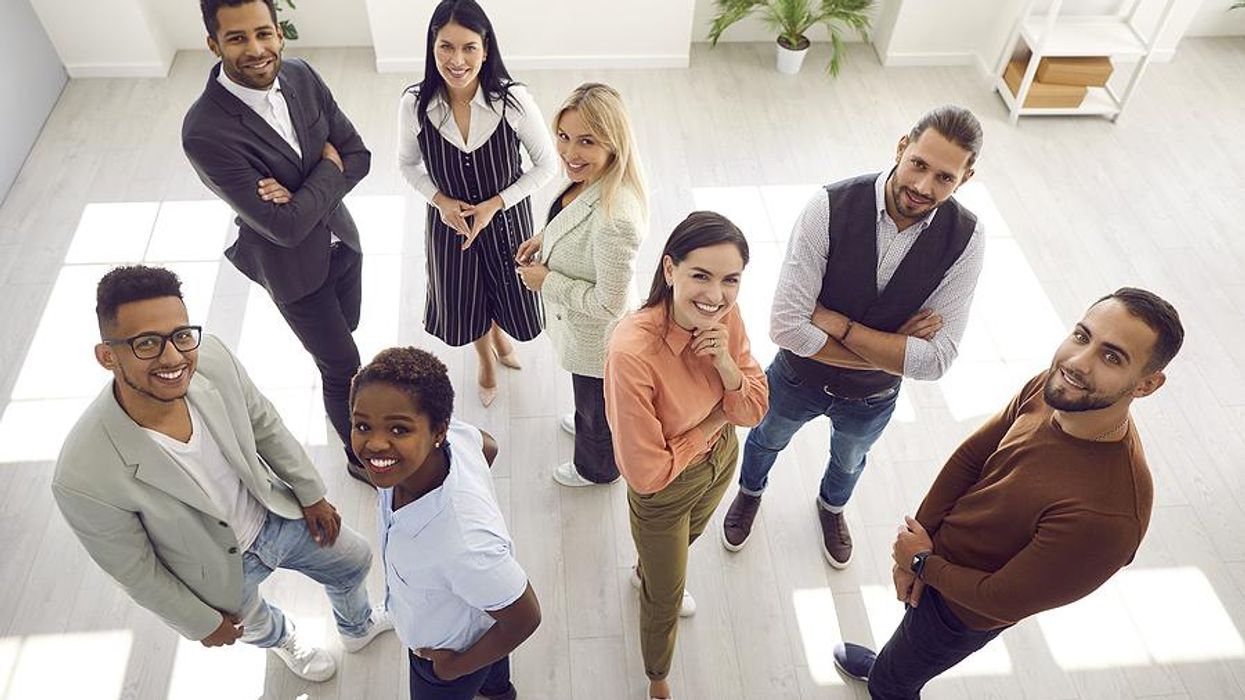 Group of happy employees at work
