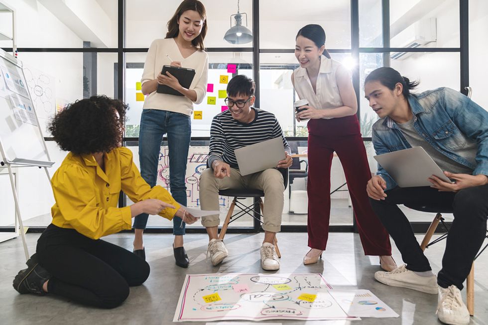 Group of happy professionals attend a workshop