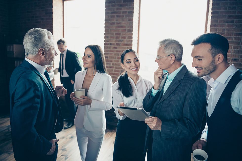 Group of professionals network at a conference