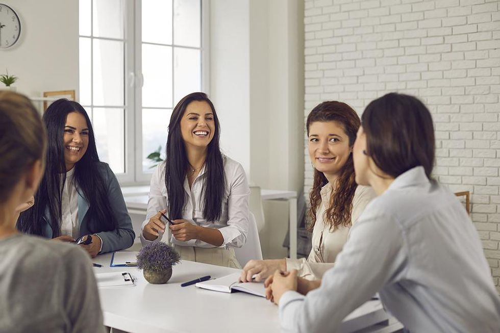 Group of women talk during a meeting