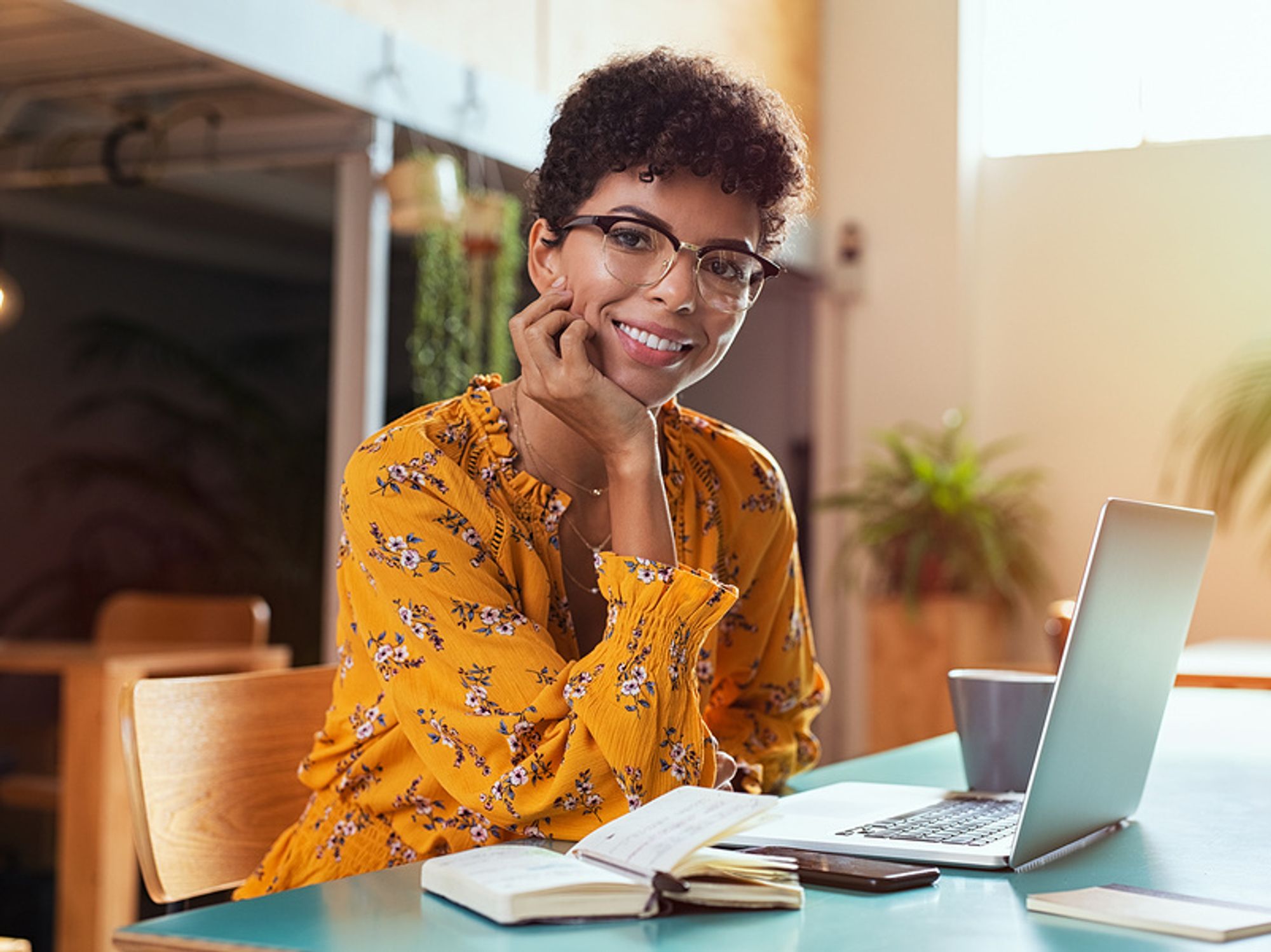 Happy and successful woman thinking about her past failures