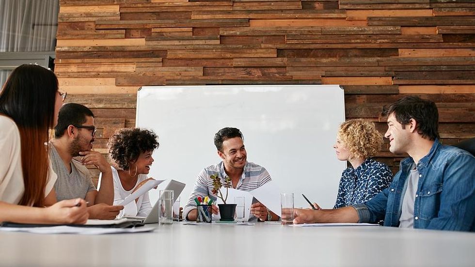 Happy business people during a project management meeting