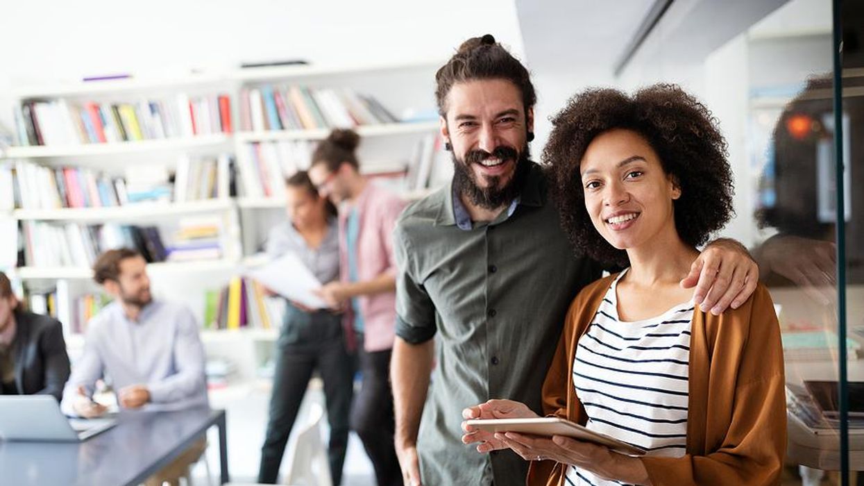 Happy coworkers are friends at work