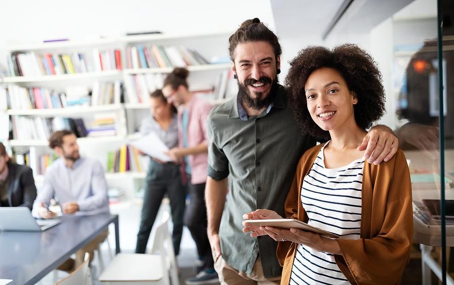 Happy coworkers are friends at work