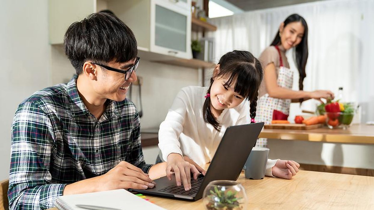 Happy dad works from home