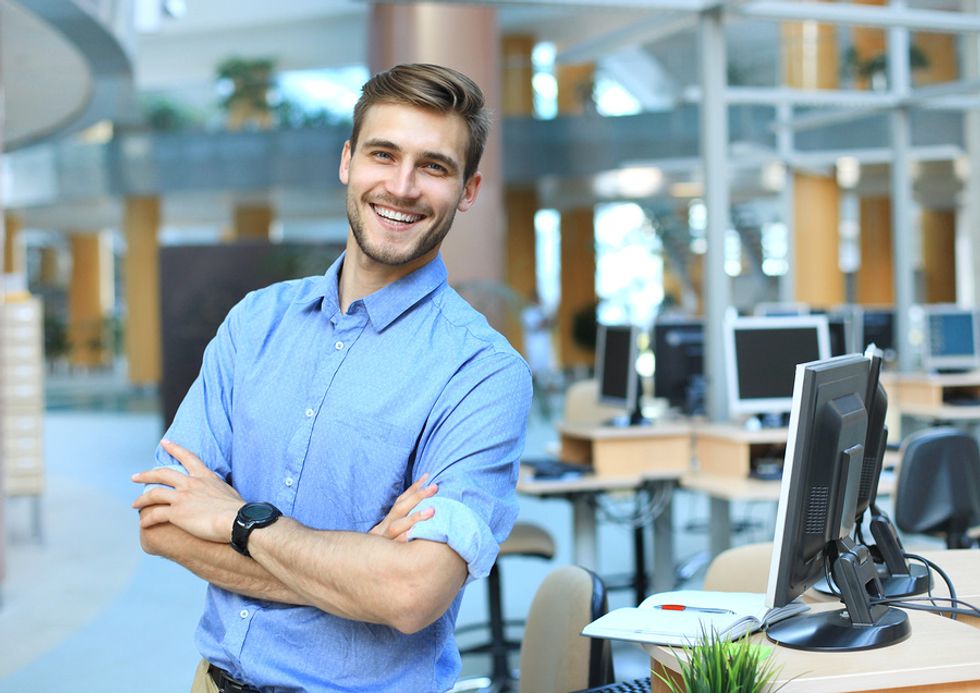 Happy employee builds personal brand in the workplace