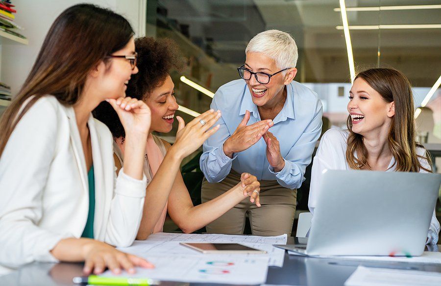 Happy employees talk to the boss they love and respect