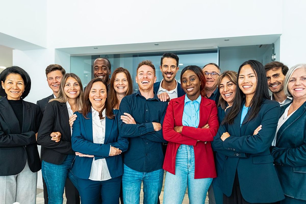 Happy employees working in a diverse and inclusive workplace