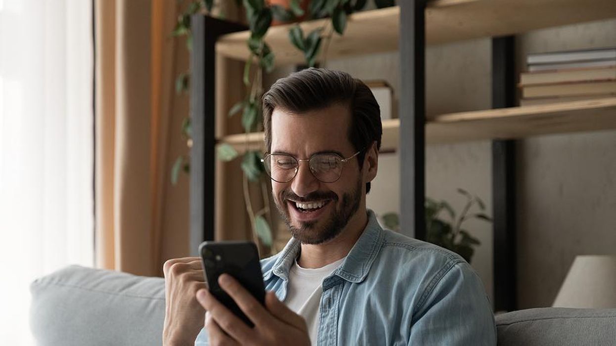 Happy man is excited about receiving a job offer