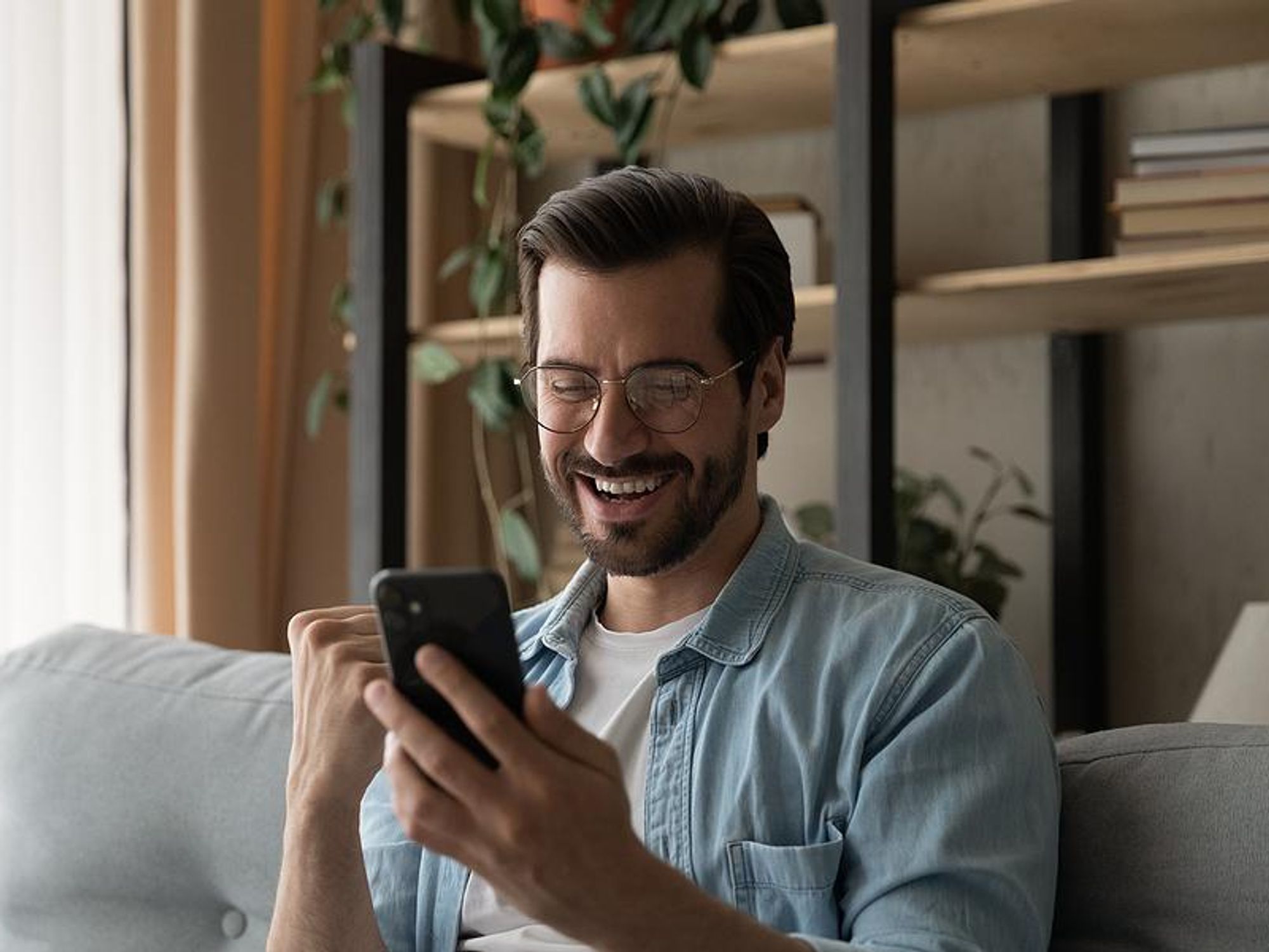 Happy man is excited about receiving a job offer