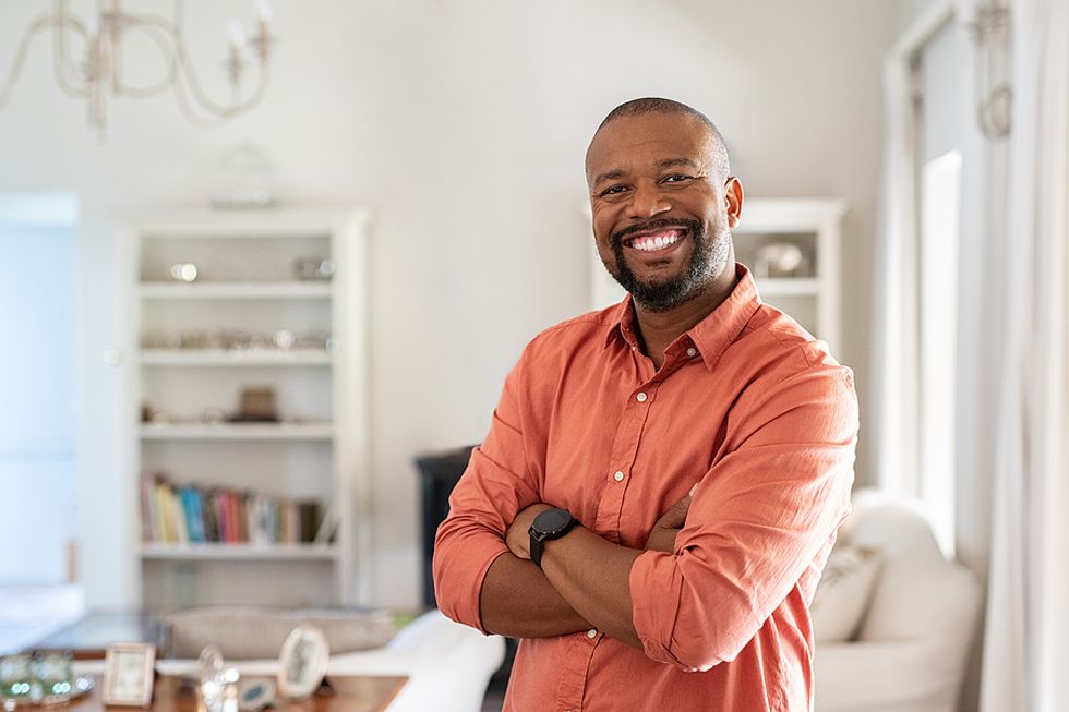 Happy professional man receives career coaching