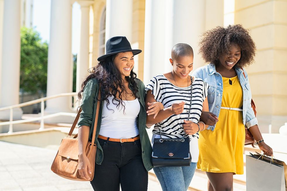 Happy professionals go shopping for new work outfits