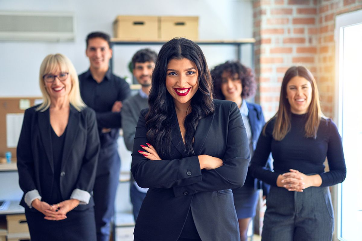 Happy professionals who work in one of the top careers for women