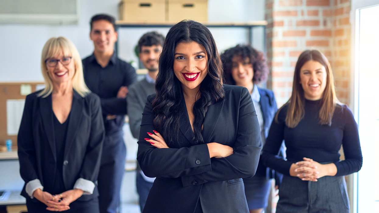 Happy professionals who work in one of the top careers for women