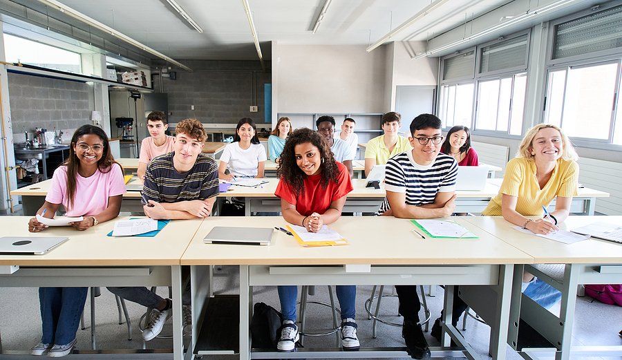 Happy students in a "perfect" classroom