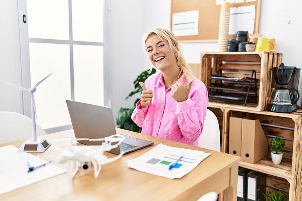 Happy woman gets a promotion at work