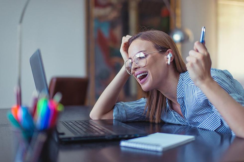 Happy woman looks for a job