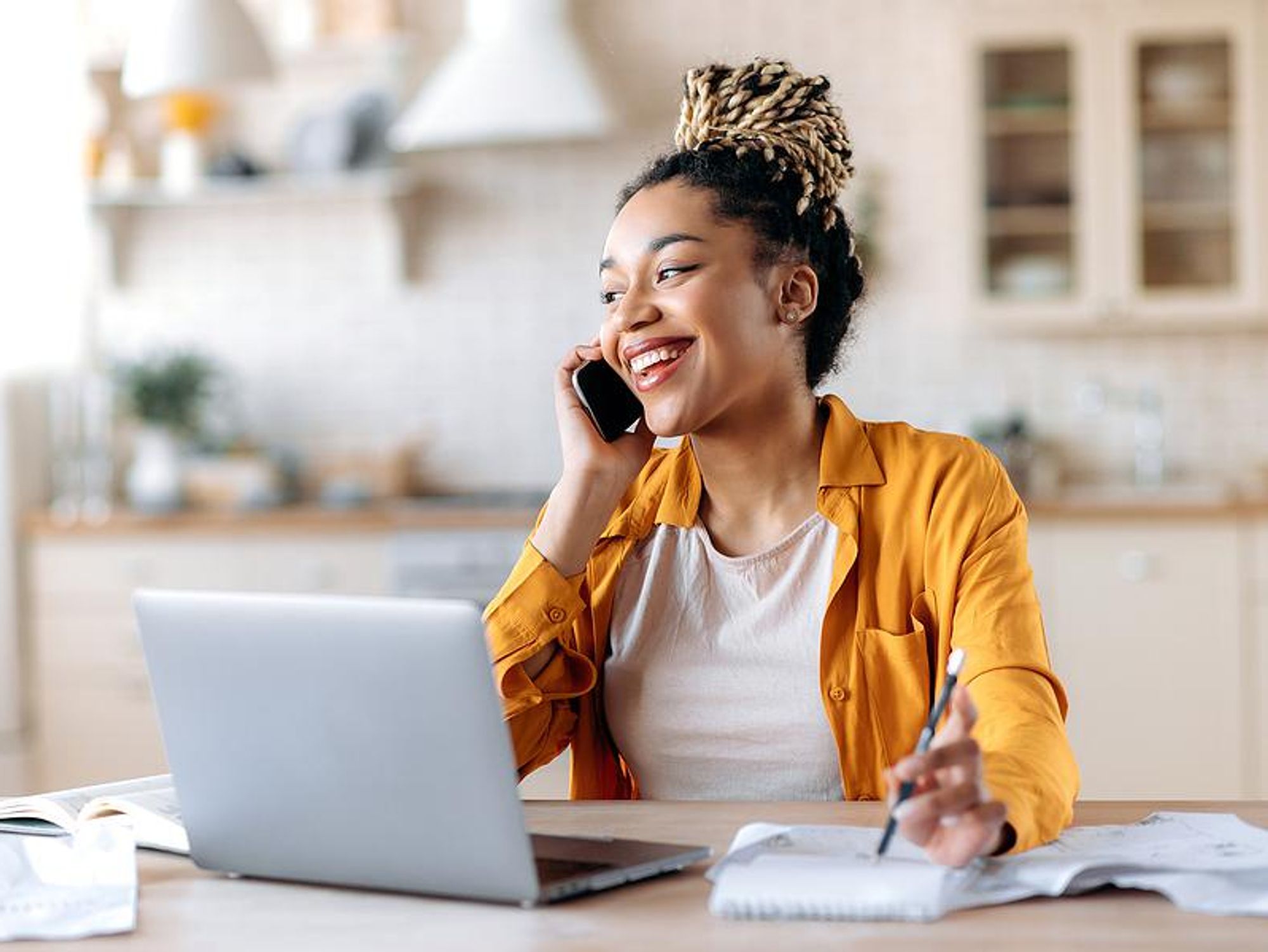Happy woman on the phone looks for a job