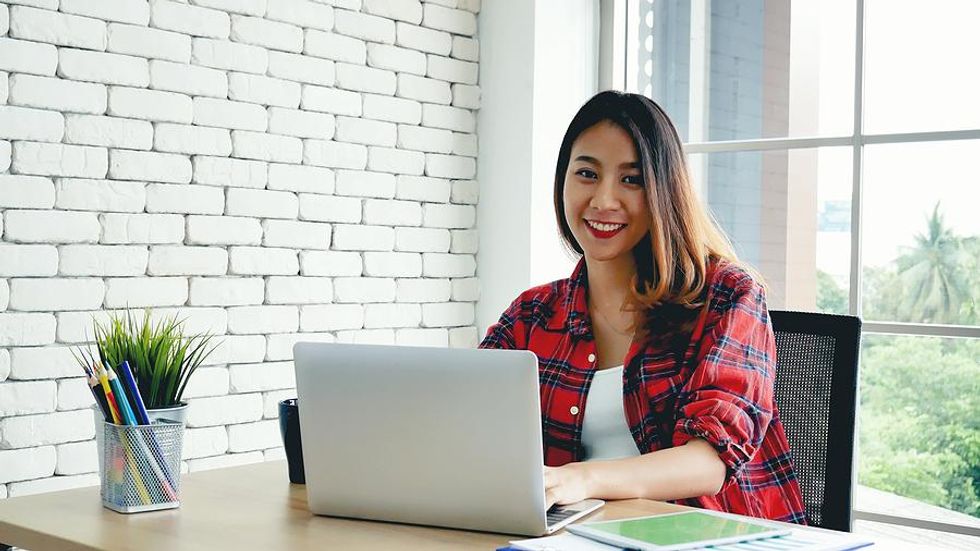 Happy woman receives career coaching