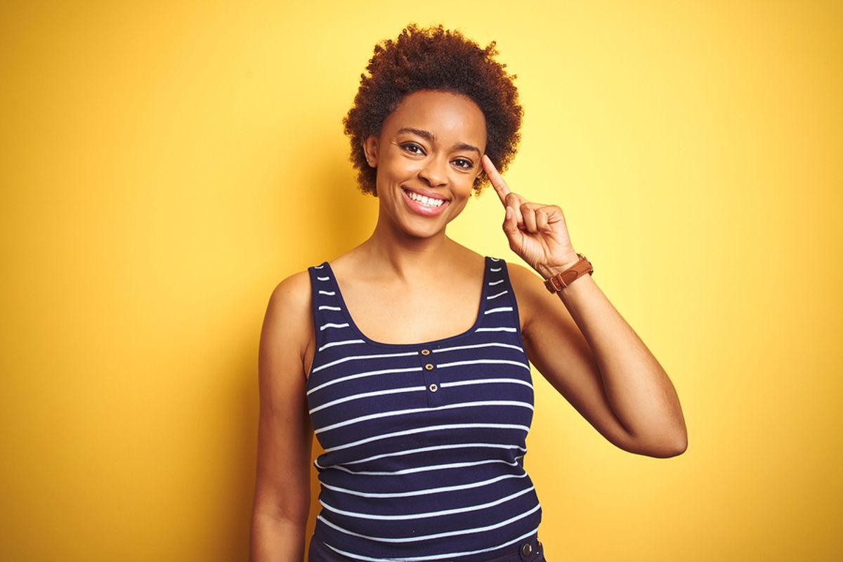 Happy woman thinking about her transferable skills for a career change