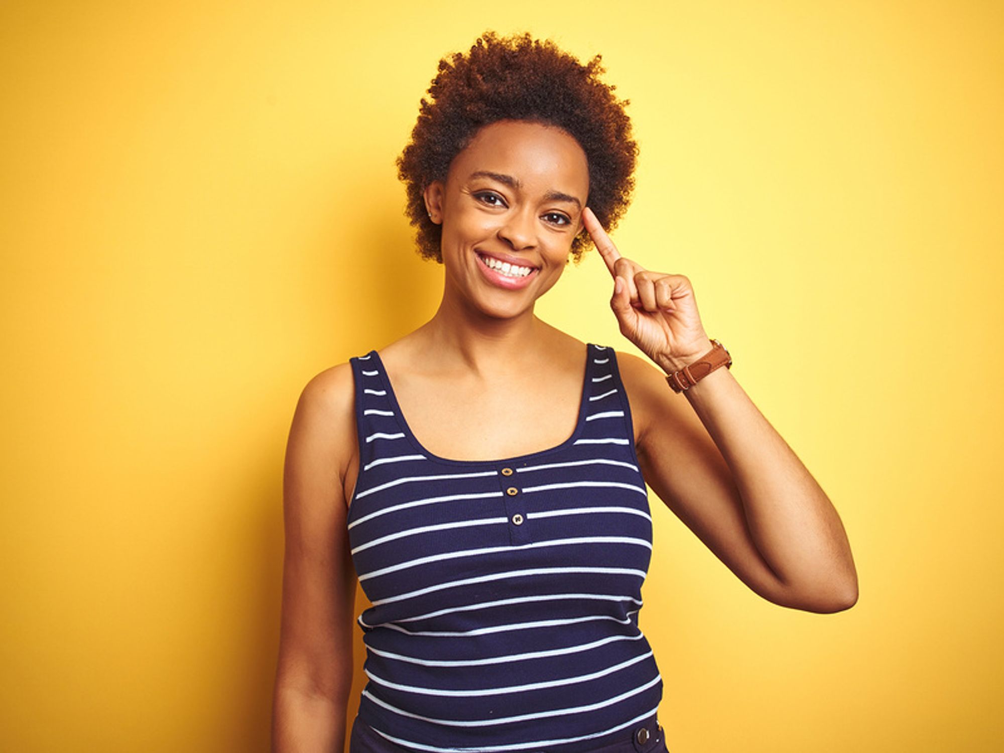 Happy woman thinking about her transferable skills for a career change