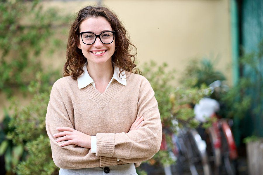 Happy young professional woman pursues her dreams