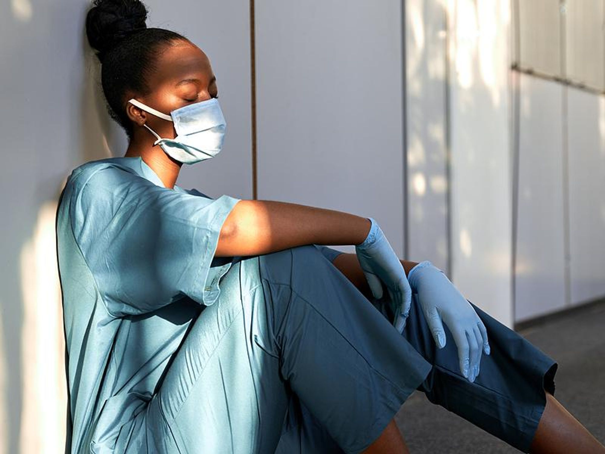 Healthcare worker experiencing burnout and compassion fatigue