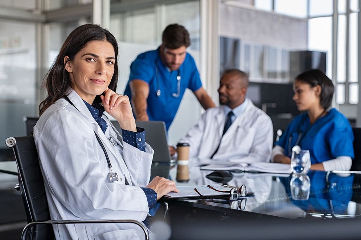 Healthcare workers discuss stress management techniques