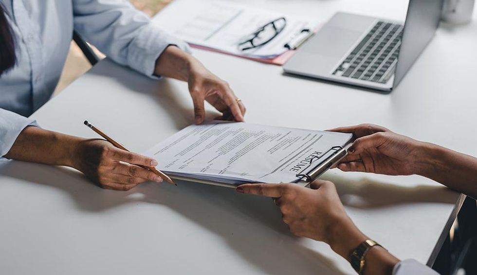 Hiring manager looks at an internal candidate's resume