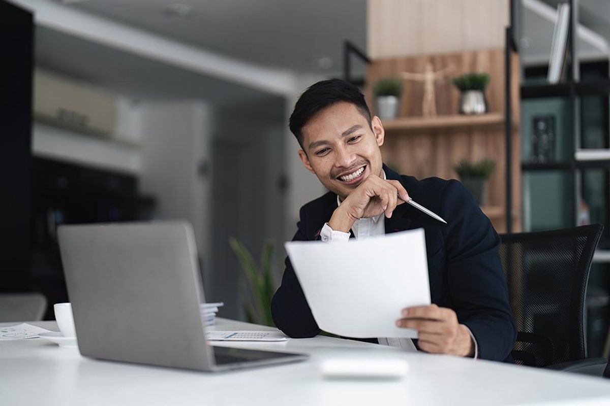 Hiring manager reads a job candidate's resume that makes them seem employable